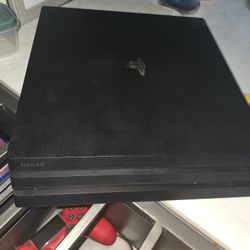 PS4 Pro 1TB + 2 Controllers + 9 Games