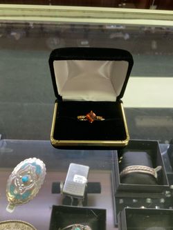 Gold Ring with Cushion Cut Orange Gemstone