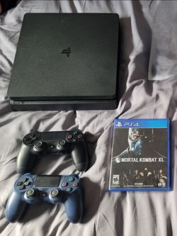 1tb Ps4 slim, game, and extra controller