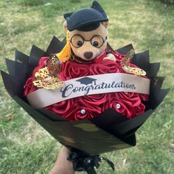 Graduation gifts boquets and leis