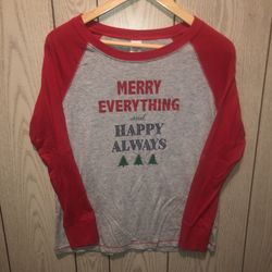 Juniors size medium (7-9) cute Christmas holiday shirt. There’s two small spots on the cuffs of the sleeves that I haven’t tried to get out. They are