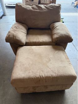 Comfy tan armchair and ottoman set