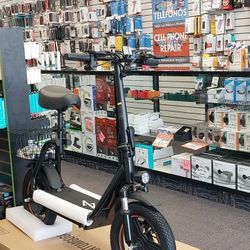 Electric Scooter , Heavy Duty , Seat And Storage Basket Sturdy And Fast 