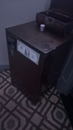 Mini fridge used top little shelf bar is broken and has a freezer