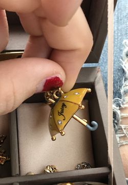 Orange/ yellow and gold juicy couture charm