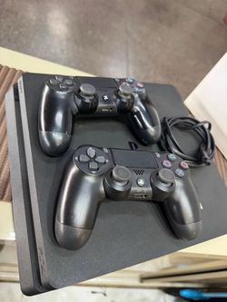 Sony PS4 Slim Console with Two Controllers