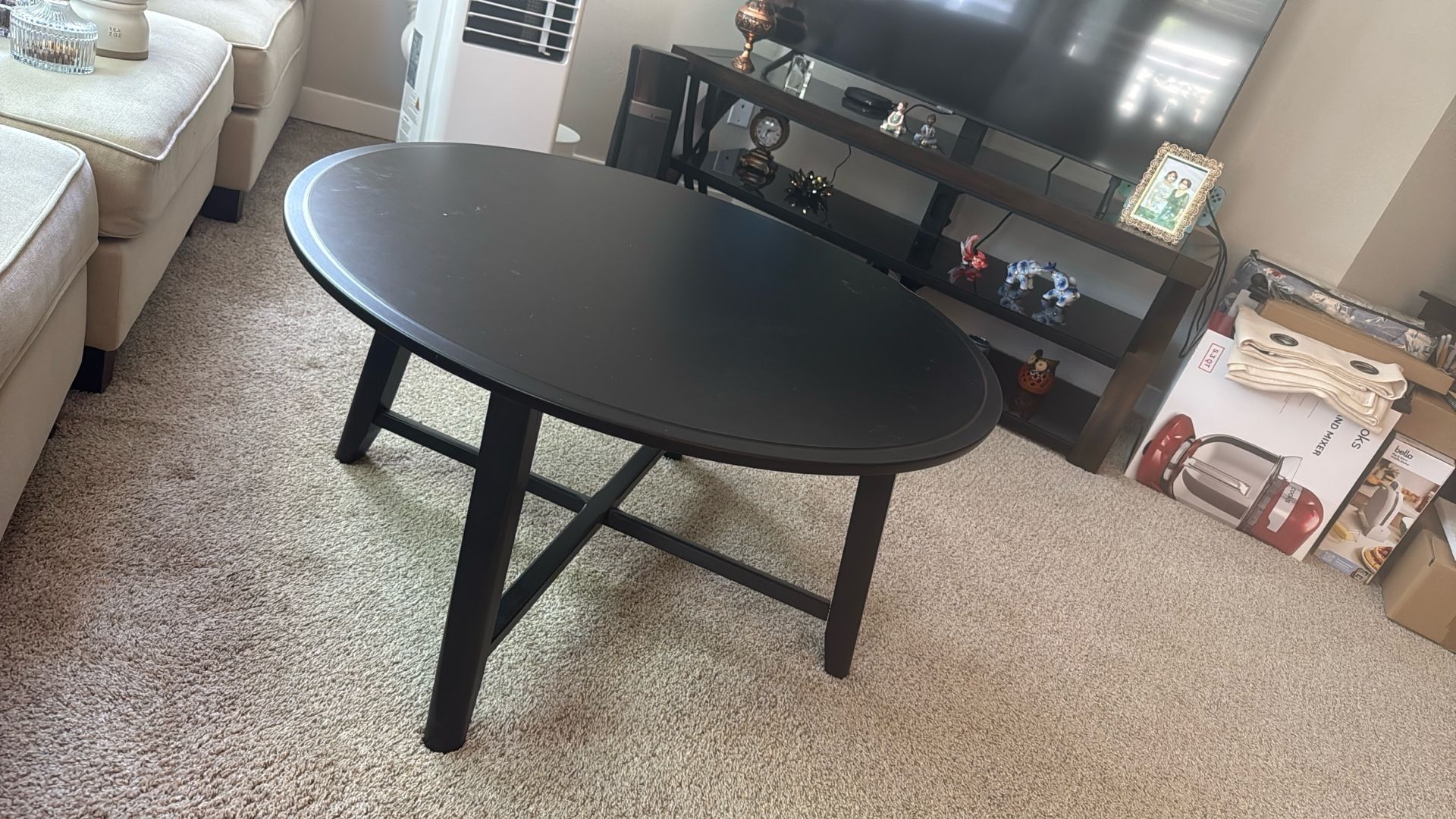 This table Is for sale Black round coffee table from IKEA