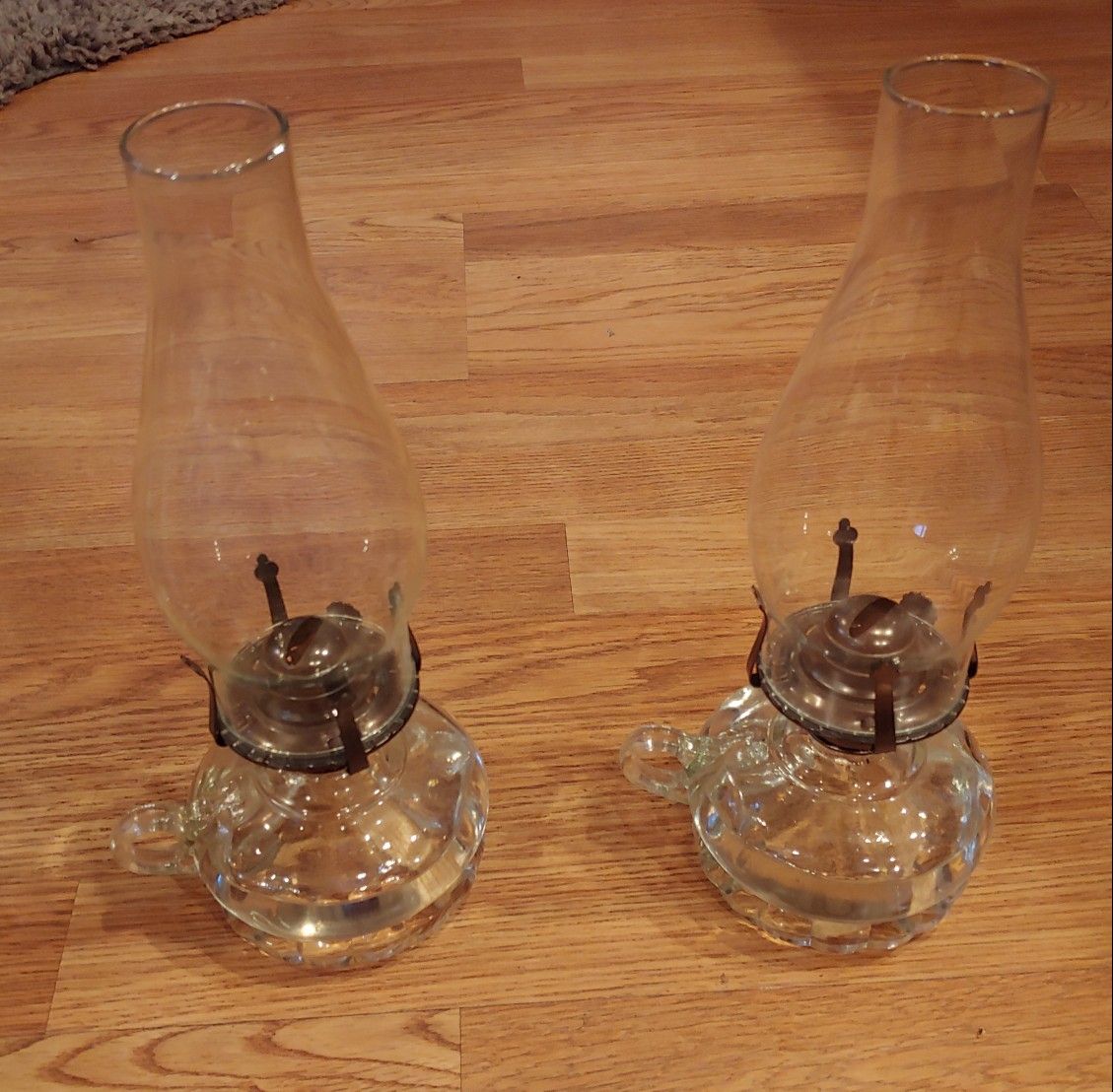 2 oil lamps w/ 3 bottles of oil
