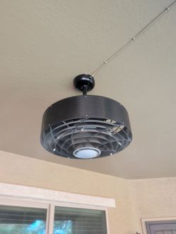 Ceiling misting fan with Light- almost new.