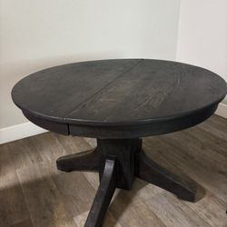 dark round wood table