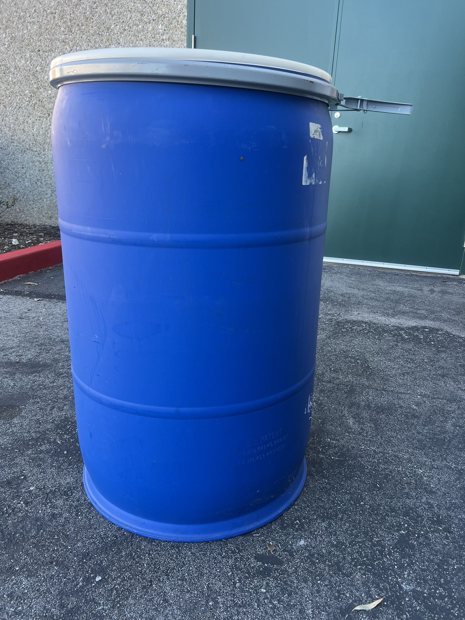 2 Blue 55 Gallon Plastic Barrel