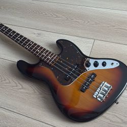 2012 Fender Japan JB62M 32” Medium Scale Jazz Bass Sunburst.
