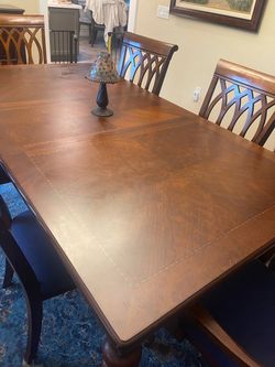 Buffet and wood table with six chairs