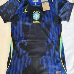 Women’s Brazilian soccer jersey. Brand new with tag. Size medium but fits like a small