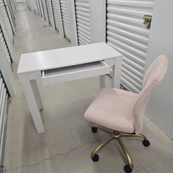 Desk with pink chair on wheels. Make offer for both. 