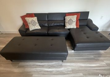 Near New Sectional And Ottoman