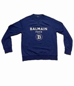 Authentic Balmain Paris navy blue sweatshirt. White coin logo print on the chest.