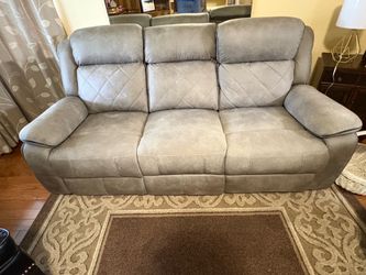 Electric reclining sofa and loveseat