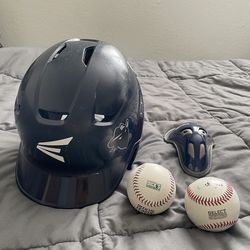 Youth baseball helmet, two balls, and groin protector