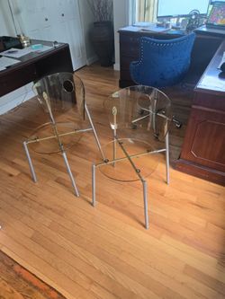 Two lucite vintage chairs