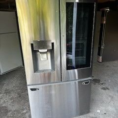 new scratch and dent refrigerators and gas grill