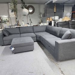 Thomasville Bryden Fabric Sectional with Storage Seats and Ottoman