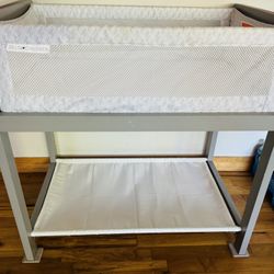 Delta Children’s Wood Grey Bassinet