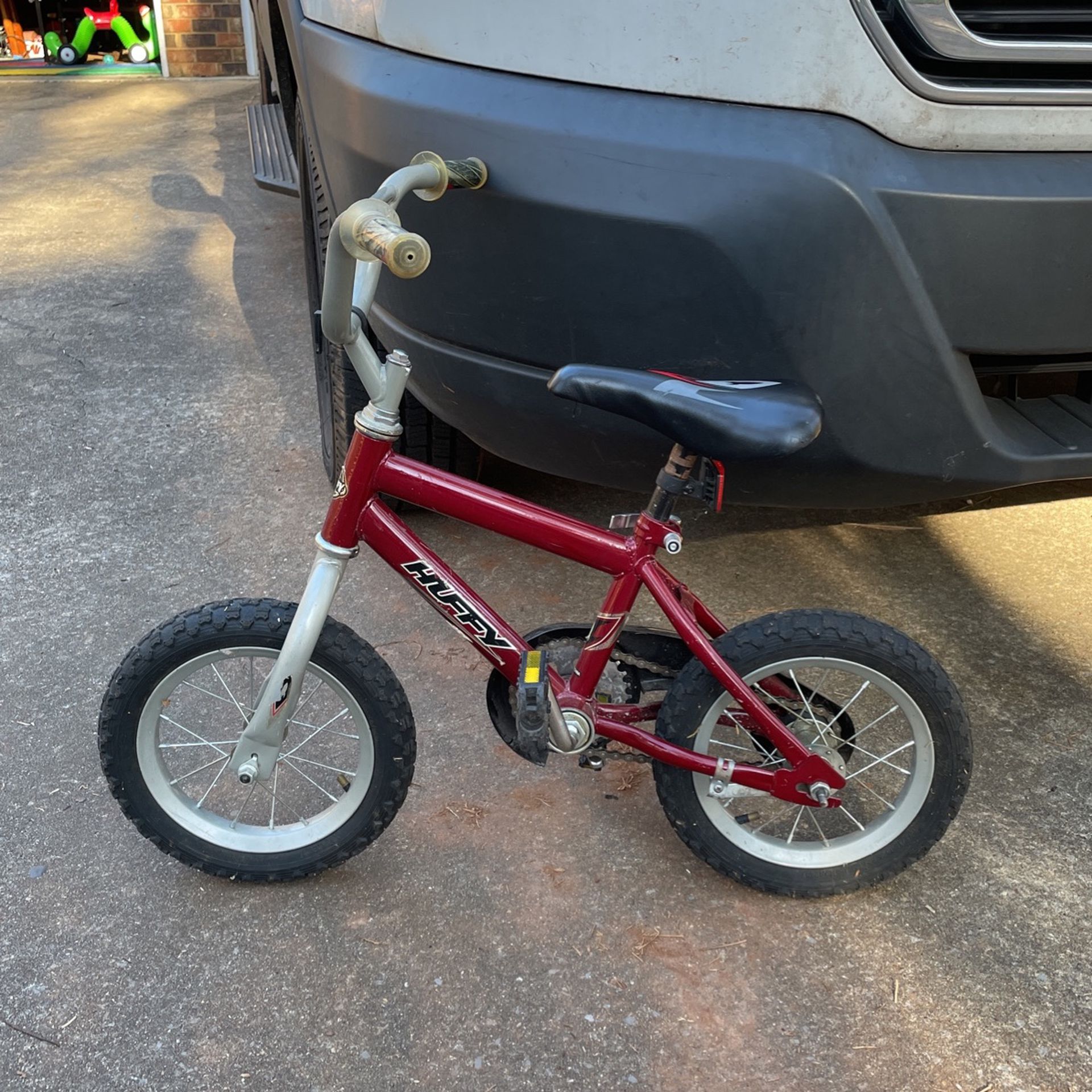 Red HUFFY Bike with 12” Wheels for a Small Child