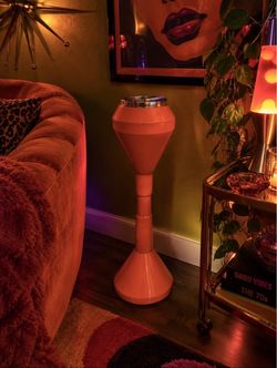 Vintage space age atomic orange cigarette stand $120