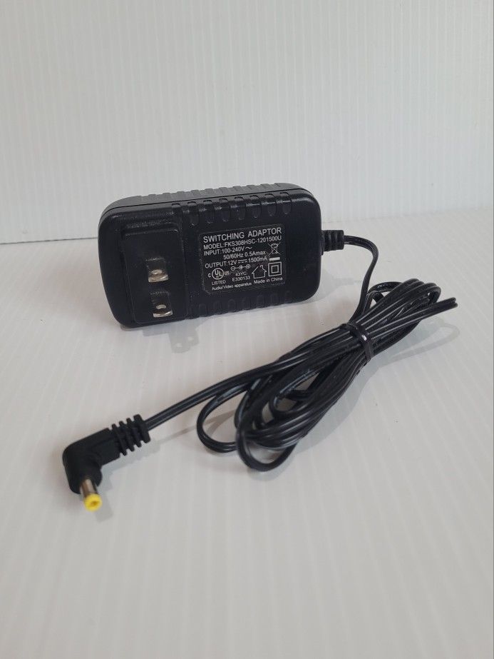 SWITCHING ADAPTER FKS308HSC-1(contact info removed) INPUT:100-240V~ 50/60Hz 0.5Amax OUTPUT:12V 1500mA Audio/Video apparatus.