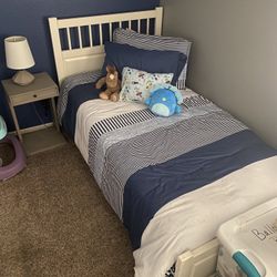 Twin Bed With New Comforter 