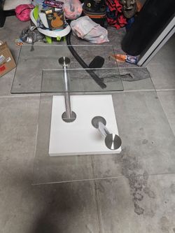 White glass swivel coffee table