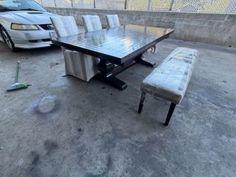 Heavy real heavy wood table with bench and 3 chairs