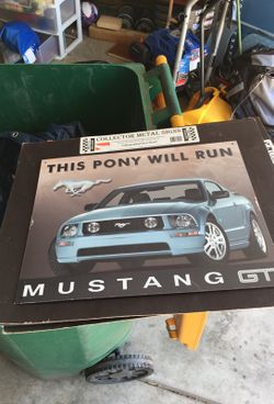 Metal mustang sign