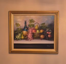 Beautiful still life fruit and wine painting in golden frame.  In excellent condition. 
25.5  X  28.5