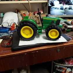 John Deere Tractor,  12 Inches Long, Plastic, Like New