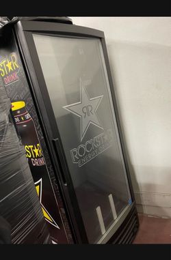 Large rockstar fridge brand new with shelves inside