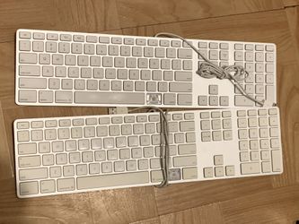 2 Apple Keyboards
