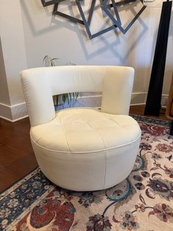 Kasala swivel arm chair x 2