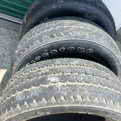 Three Firestone LT 285/60/20 tires