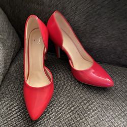 Woman’s Red Stiletto Heels In Size 7
