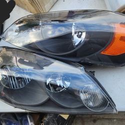 2006 / 2016 CHEVY IMPALA HEAD LIGHTS 
