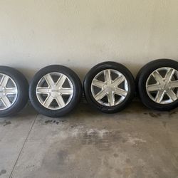 Factory Rims And Tires Off  A  2011 GMC Terrain 