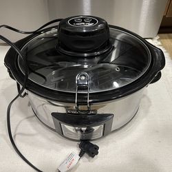 Slow cooker with autostir