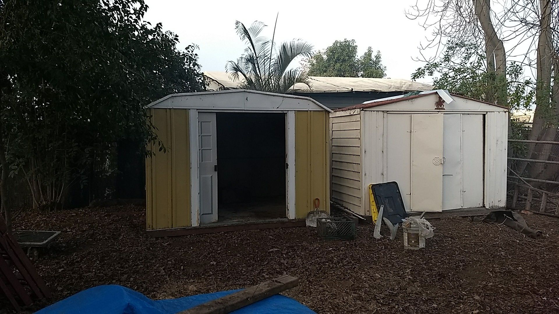 Two metal sheds