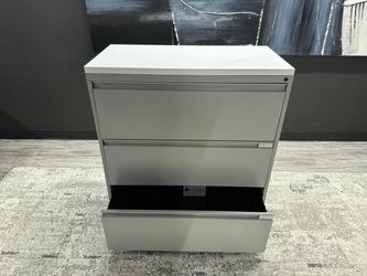 3-drawer lateral file with white top. 3Wx18Dx40T