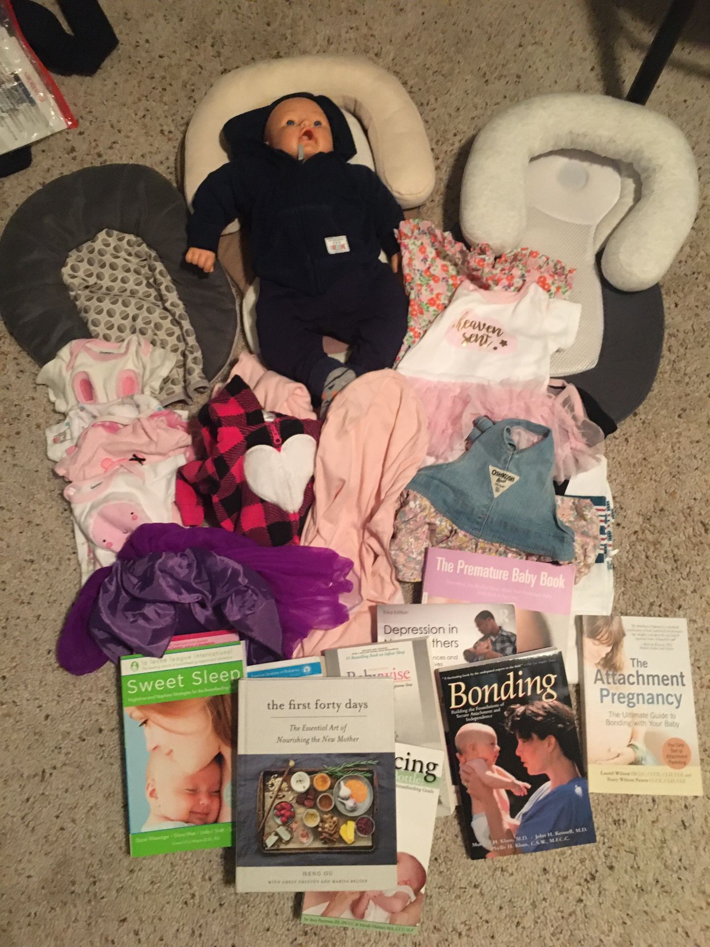 Baby clothes, practice baby, books