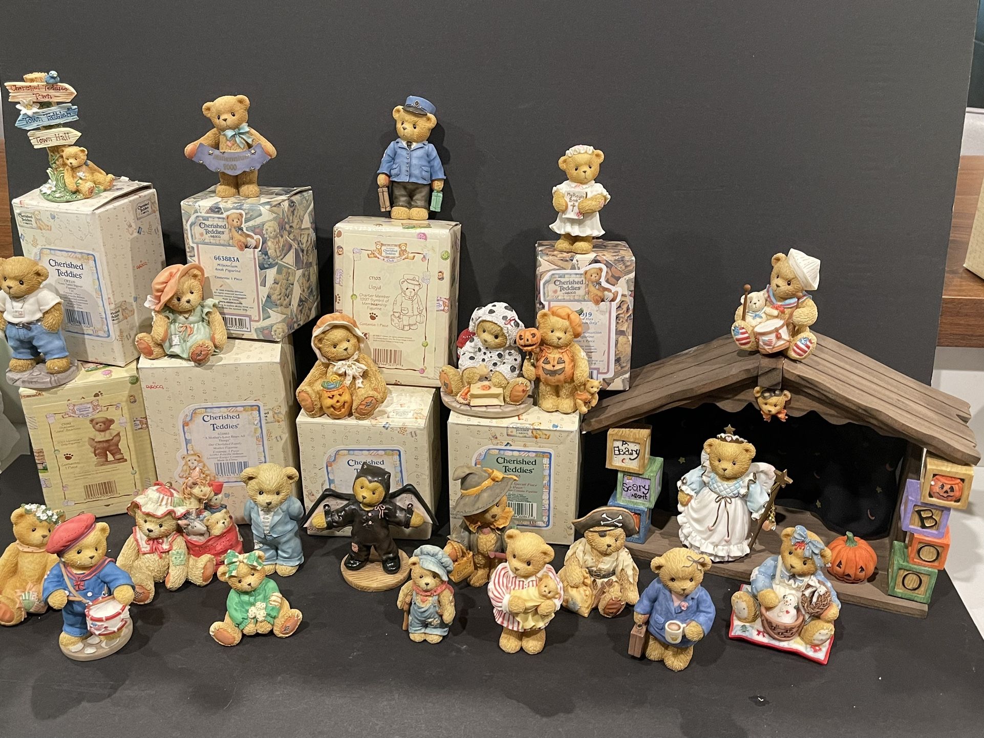 Collection of Enesco Cherished Teddie’s including Halloween house. Set of 24, all in good condition, some in original boxes.