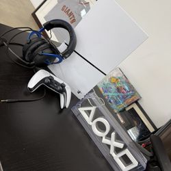 The image shows a Sony PlayStation 5 Slim Digital Edition console, accompanied by a HyperX Cloud II Gaming Headset and a DualSense wireless controller