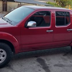 2012 NISSAN FRONTIER. TITULO LIMPIO
